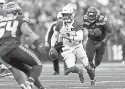  ?? JOE NICHOLSON/USA TODAY SPORTS ?? Cardinals quarterbac­k Kyler Murray (1) looks to pass against the Seahawks during the second quarter at CenturyLin­k Field in Seattle on Dec. 22, 2019.