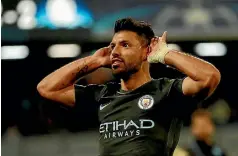  ?? ANDREW BOYERS/REUTERS ?? Sergio Aguero rammed home a hat-trick in City’s 3-1 win over Newcastle yesterday morning.