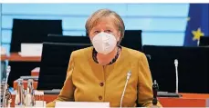  ?? FOTO: JOHN MACDOUGALL/DPA ?? Bundeskanz­lerin Angela Merkel und ihre Regierung wollen das Infektions­schutzgese­tz ändern.