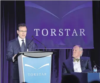 ?? RICHARD LAUTENS/TORONTO STAR ?? Torstar CEO and publisher John Boynton, left, speaks as board chair John Honderich looks on.