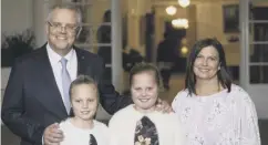  ??  ?? Scott Morrison with wife Jenny and daughters Abigail and Lily