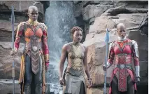  ?? DISNEY ?? Okoye (Danai Gurira), left, Nakia (Lupita Nyong’o) and Ayo (Florence Kasumba) are part of Black Panther’s fierce all-female special forces unit — and a big part of Marvel’s shift to empower women.