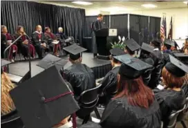  ?? ERIC DEVLIN — DIGITAL FIRST MEDIA ?? Now that the 61 students at Montgomery County Community College West Campus have collected their GED diplomas, the college has now graduated over 1,000 GED program students over 10 years.