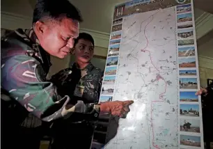  ?? AP ?? Philippine military chief Gen. Gregorio Pio Catapang explains to reporters about the peacekeepe­rs escape at the Golan Heights at Camp Aguinaldo headquarte­rs in Quezon city, —