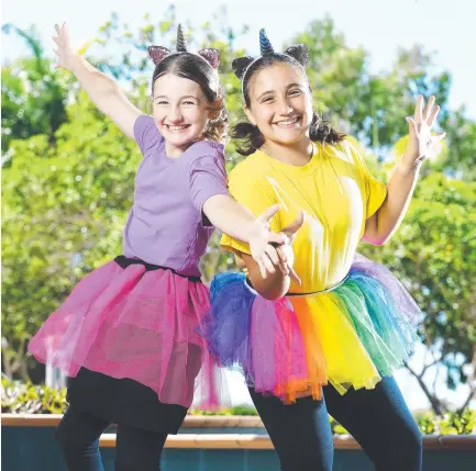 ??  ?? Ryan Catholic College students, Eva Donegan, 11, and Isabella Hill, 12. Picture: Shae Beplate
