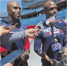  ?? HERALD PHOTO BY KAREN GUREGIAN ?? PAIR OF ACES: New Patriots cornerback Jason McCourty (right) talks to the media yesterday accompanie­d by his twin brother and Pats safety Devin McCourty.