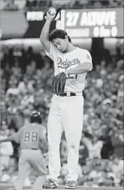  ?? Robert Gauthier Los Angeles Times ?? YU DARVISH, who had a couple of wretched starts in the World Series, including a f ive- out meltdown in Game 7, says he would like to return to the Dodgers.