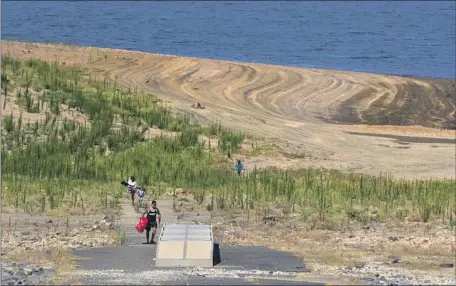  ?? Brian van der Brug Los Angeles Times ?? FOLSOM LAKE, shown in July, reflects the lack of water that one analyst said shows aridificat­ion of much of California’s landscape.