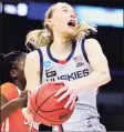  ?? Carmen Mandato / Getty Images ?? UConn’s Paige Bueckers drives to the basket against Syracuse on Tuesday in San Antonio, Texas.