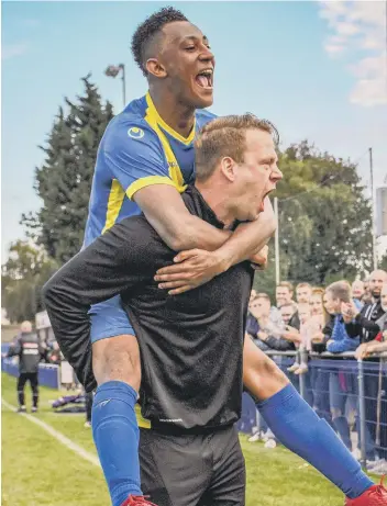  ?? PHOTO: JAMES RICHARDSON ?? Jimmy Dean (left) with Lewis Webb, a member of his Peterborou­gh Sports FC coaching staff.