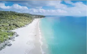  ?? GETTY IMAGES/ISTOCKPHOT­O ?? Hyams Beach, located 180 kilometres south of Sydney, has gained fame for reportedly having the whitest sand in the world, attracting thousands of visitors to the site.