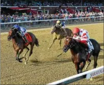 ?? CHELSEA DURAND/NYRA ?? Mind Control with John Velazquez is the upset winner for Greg Sacco in the final stakes race of the year, the G1Hopeful at Saratoga Race Course.