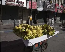  ?? AP ?? Palestinia­n shops are closed in Ramallah, the occupied West Bank city, in solidarity with war-battered Gazans