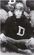  ??  ?? JFK in his school football team, 1926