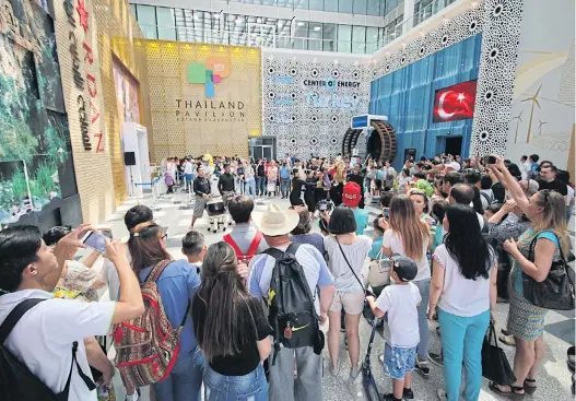  ??  ?? ABOVE Tourists visit the Thai pavilion at World Expo 2017 in Astana.