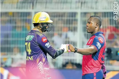  ?? IPLT20.COM ?? Former West Indies spinner-turned-all-rounder, Sunil Narine is greeted by West Indies captain Rovman Powell after he slammed a century for the Kolkata Knight Riders against the Rajasthan Royals in the Indian Premier League yesterday.