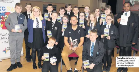  ??  ?? Good read Author Dan Freedman with some of the North Lanarkshir­e pupils