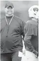  ?? JIM RASSOL / SUN SENTINEL ?? Tom Abel coaches during a Wellington football practice. Abel has stepped down from his position as the Wolverines head coach after nine seasons, athletic director Bobby Callovi told the Sun Sentinel.