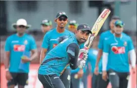  ?? AFP ?? Bangladesh’s Tamim Iqbal practices ahead of their 100th Test against Sri Lanka in Colombo.