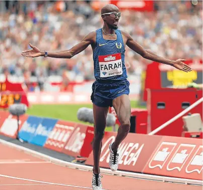  ?? PA. ?? Mo Farah crosses the line to win Saturday’s 5,000 metres at the Olympic Stadium in London.