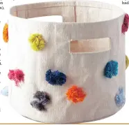  ??  ?? Basic cream meets bright cotton tufts on the Rainbow Tufts can be used to tote binders and notebooks around the house if your student is a mobile learner or to store textbooks beside the bed.