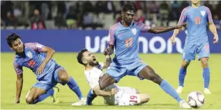  ?? – File Photo ?? HARD FOUGHT: Bahrain’s midfielder Kamil Al Aswad, left, fights for the ball with India’s midfielder Rowllin Borges, right, during the 2019 AFC Asian Cup Group A match.