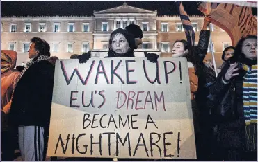  ??  ?? DISILLUSIO­N: Greeks demonstrat­e against austerity as they struggle in the eurozone