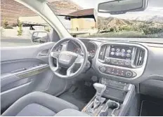  ??  ?? The interior’s commendabl­y quiet. Combined with supportive and comfortabl­e cloth seats, the Canyon would be a friendly companion on a long trip. Crank up the XM satellite radio, set the cruise control and relax.