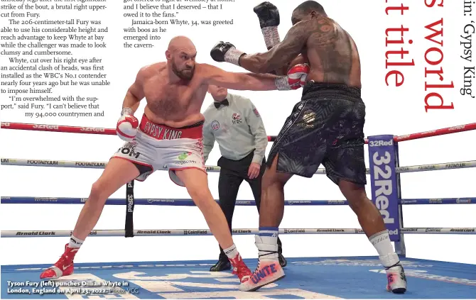  ?? ?? Tyson Fury ( left) punches Dillian Whyte in London, England on April 23, 2022. Photo: VCG