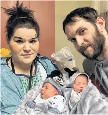  ?? KEVIN ADSHADE/THE NEWS ?? Twin siblings Lincoln, left, and Lydia, with mom Sonia Joy Crim and dad Justin Holman. The twins were born Jan. 2.