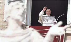  ?? GIORGIO ONORATI, AP ?? Pope Francis greets people during the Angelus prayer in St. Peter’s Square at the Vatican on Sunday.