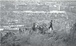  ?? MICHAEL SCHENNUM/THE REPUBLIC ?? Josefina Huerta, of Phoenix, hikes up the Piestewa Peak Summit Trail in Phoenix on Feb. 29, 2012.