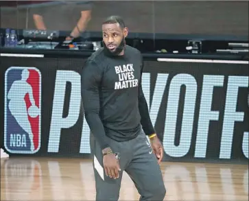  ?? Kim Klement Associated Press ?? LeBRON JAMES on the shooting of Jacob Blake in Wisconsin: “I know people get tired of hearing me say it, but we are scared as Black people in America. Black men, Black women, Black kids, we are terrified.”