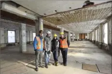  ??  ?? Ray Hutton, left, with Greg Sather, Joanne McCallum and building developer Meir Dick are part of a project that aims to bring the old building back to life.