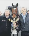  ??  ?? 0 Elliott, left, with Tiger Roll owner Michael O’leary