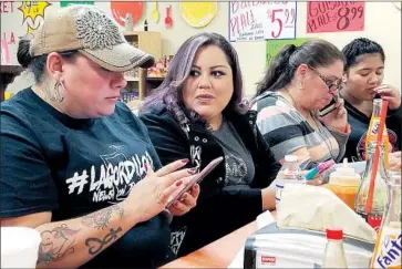  ?? Photograph­s by Molly Hennessy-Fiske Los Angeles Times ?? VIDEO BLOGGER Priscilla Villarreal Treviño, left, known online as Lagordiloc­a, issues bilingual reports on crime to followers locally and nationwide. She mixes raw news and gossip, spiced with Spanish expletives.