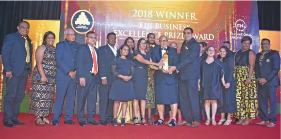  ?? Photo: Karalaini Tavi ?? President’s Business Excellence Award winner Future Farms (Pte) Limited trading as Rooster Poultry staff and management with the President Major General ret’d Jioji Konrote (middle) at the Fiji Business Excellence Awards night at the Sheraton Fiji Resort, Denarau on November 3, 2018.