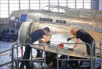  ?? TY GREENLEES / STAFF ?? A wingtip of the famed B-17 Memphis Belle is attached inside the restoratio­n hangar on Wednesday at the National Museum of the U.S. Air Force at Wright-Patterson Air Force Base.