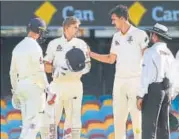  ?? REUTERS ?? Joe Root has a word with Australia pacer Mitchell Starc after his delivery hit the England captain on the helmet grille.