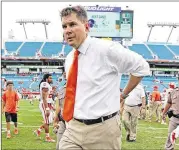  ?? AL DIAZ / MIAMI HERALD ?? Miami’s Al Golden on Sunday became the latest FBS coach to be fired. In total, 84 of the 128 FBS schools have changed coaches within the past two years.