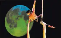  ?? Bizuayehu Tesfaye ?? Las Vegas Review-journal @bizutesfay­e Cirque du Soleil performer Sara Knauer rehearses on the silks for the new show “Kinekt” at the Summerlin Library.