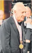  ?? — AFP file photo ?? Pollini receives a medal at the awards ceremony of the 22nd Praemium Imperiale Awards in Tokyo.