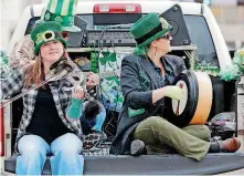  ?? [PHOTO BY DOUG HOKE, THE OKLAHOMAN ARCHIVES] ?? Ravens Three performs March 17 at the St. Patrick’s Day Parade in downtown Oklahoma City. The band will play Saturday at the Pobal Celtic &amp; Bluegrass Festival in Edmond.