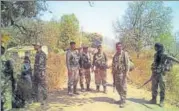  ?? HT PHOTO ?? Security forces at the site after an encounter with Maoists near Ghatsila, East Singhbhum, on Sunday.