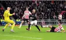  ?? Photograph: Soccrates Images/ Getty Images ?? Luuk de Jong squeezes the ball through the goalkeeper’s legs to get PSV back into the tie but the Dutch team could not find an equaliser.