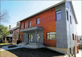  ?? Nate Guidry/Post-Gazette ?? A view of a duplex with Passive House energy-efficient technology in Squirrel Hill.