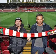  ?? PETER BYRNE ?? Wrexham co-chairmen Rob McElhenney and Ryan Reynolds