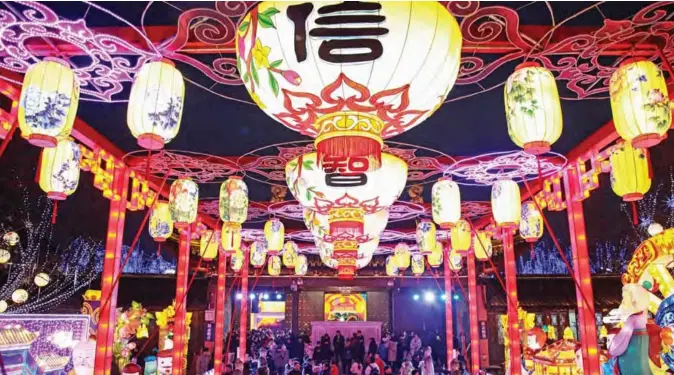  ?? — AFP ?? This photo shows people visiting a lantern show to celebrate the Lantern Festival, which marks the end of Lunar New Year celebratio­ns, in Nanjing in China’s eastern Jiangsu province.