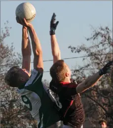  ??  ?? Paddy Devereux of Crossabeg-Ballymurn wins this duel in the air with Jim Rossiter (Forth and Bargy Gaels).