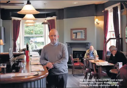  ??  ?? The Railway pub in Hinckley enjoyed a major refurbishm­ent. Pictured: Manager Adam Crump in the newly refurbishe­d bar area